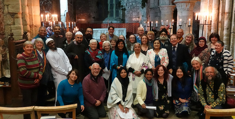 A group of Interfaith leaders gather in Iona Abbey.