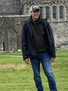Man standing outside Iona Abbey
