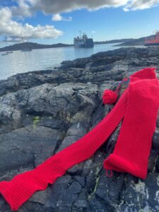 thin red line scarf outside