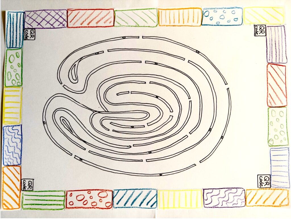 A drawing of a finger labyrinth surrounded by colourful rectangles
