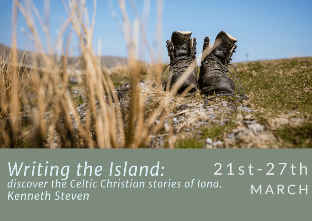 A pair of hiking boots on sandy and grassy ground. For writing the island week at iona Abbey