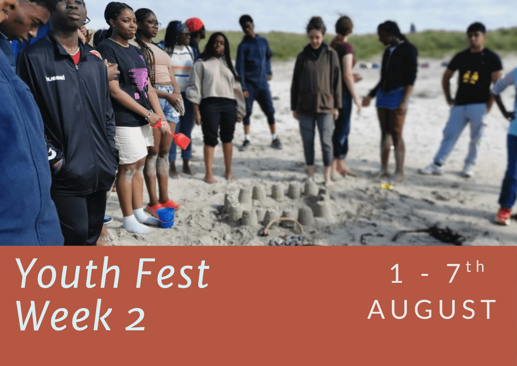 young people playing on beach at youth fest on iona